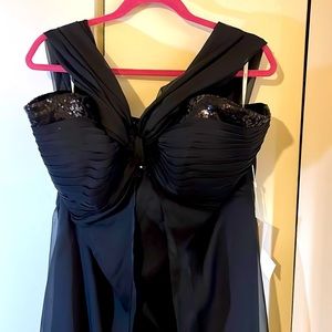 Black, full length gown with sequin accents on Sweetheart neck made of chiffon
